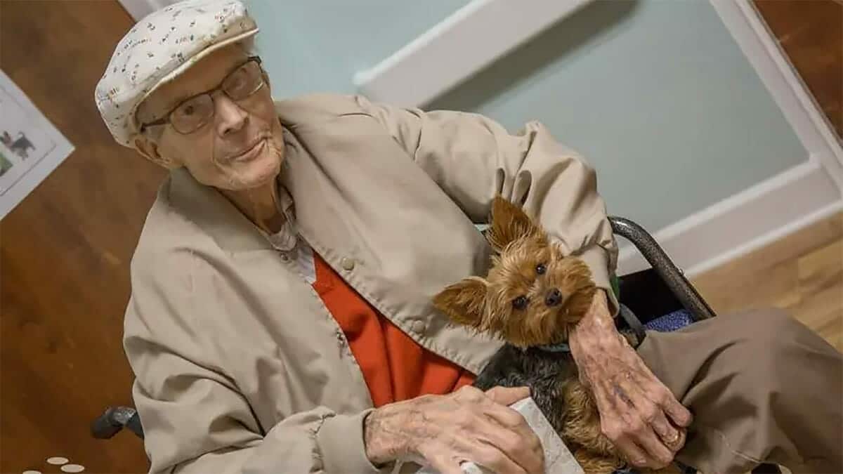 elderly man and dog in hospice