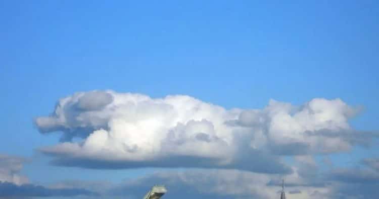 cloud formation shows dog playing in heaven 