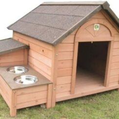 large dog house with feeding bowls