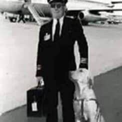 Pilot with a seeing eye dog