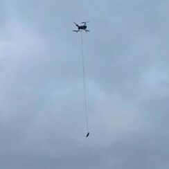 drone dangling sausages to rescue a dog