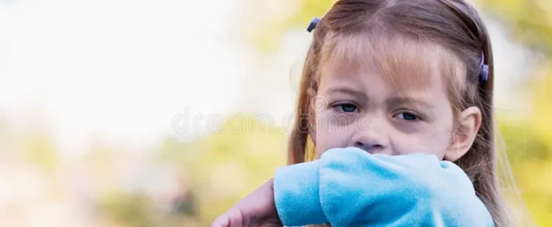 child sneezing